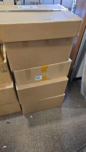 How should I dispose of packing materials after moving