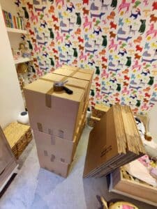 How should I dispose of packing materials after moving